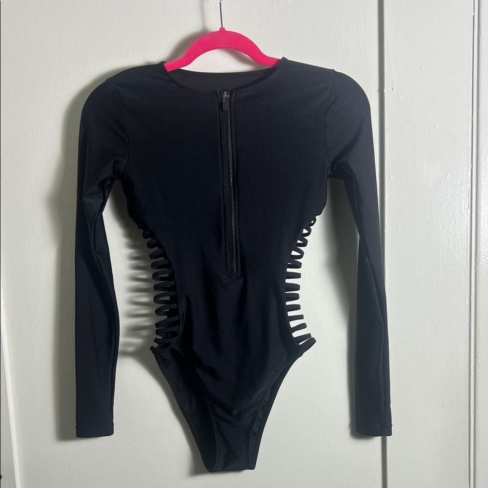 Black Long-Sleeve, Hight Waist, One-Piece Swimsuit with Side Cutouts.